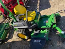 John Deere 2720E w/ a pull behind catcher